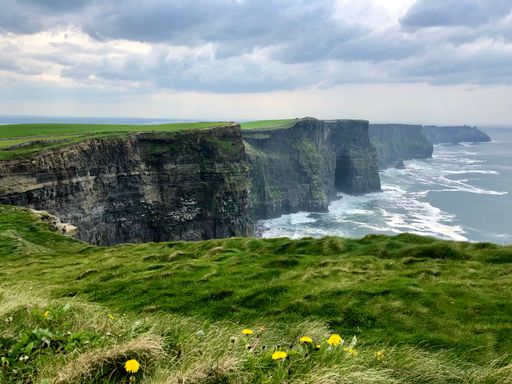 The Cliffs of Moher are sea cliffs located at the southwestern edge of the Burren region in County Clare, Ireland