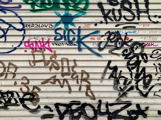 A closeup shot of the graffiti on a garage door in Eindhoven, Netherlands