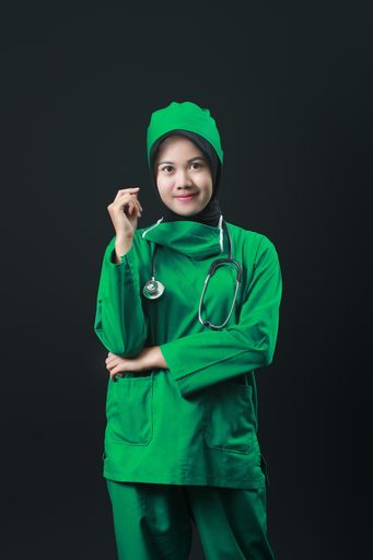 Smiling Nurse with stethoscope isolated on black background. Medical and Healthcare Concept