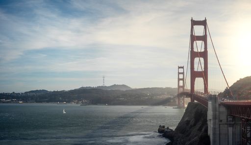 A landscape shot of the Golden Gate strait with the Golden Gate Bridge visible in the shot