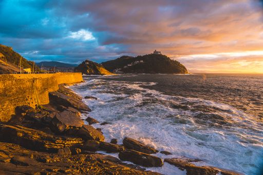 The beautiful sunset over the river and the sea in the city of San Sebastian, Gipuzkoa, Spain