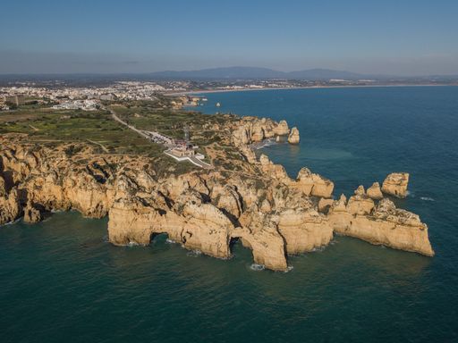 The aerial shot of the beautiful city of Lagos from Ponta da Piedade headland in Algarve, Portugal