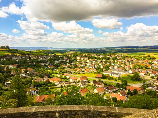 A beautiful sunny view of the Konigsberg village in Bayern under a cloudy sky