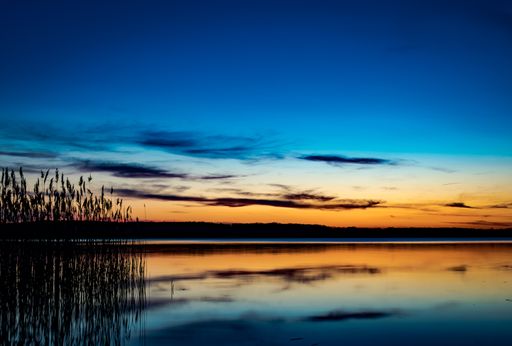 A beautiful photo of sunset at Dripping Springs Lake