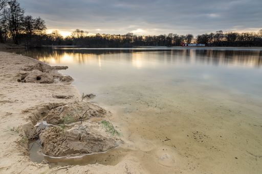 An evening view with reflections in the Silbersee, Germany, Lower Saxony, Hanover, Langenhagen