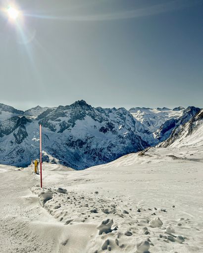 A vertical shot of snow-covered mountains during winter in Passo Tonale, Italy
