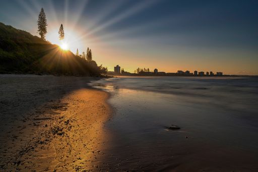 A mesmerizing view of a beautiful seascape at scenic sunset in Queensland, Australia