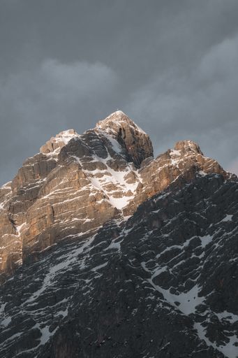 A beautiful view of a snowy landscape with mountains on a sunny day