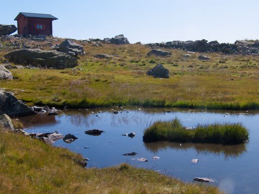 A small rocky pond in the mountains of Lac de la Combe, Haute Savoie, France