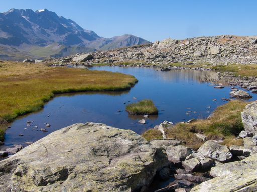 A small rocky pond in the mountains of Lac de la Combe, Haute Savoie, France
