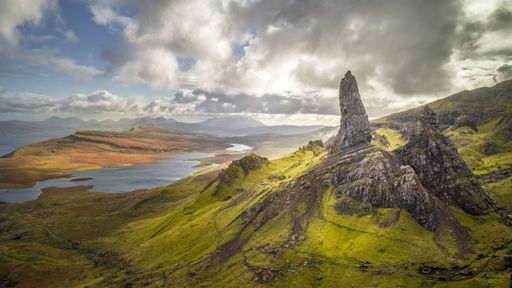 A view of the Old Man of Storr on the Isle of Skye in Scotland under a cloudy sky