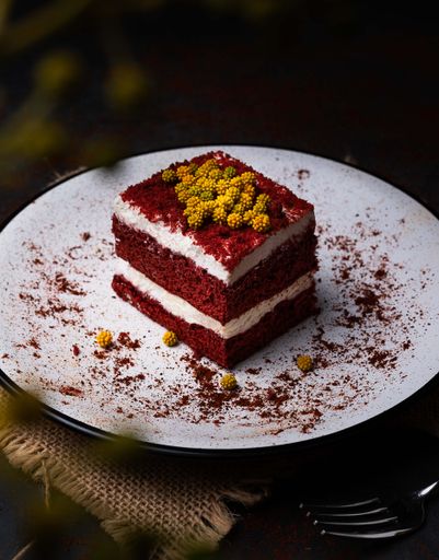 closeup photo of piece of red cake