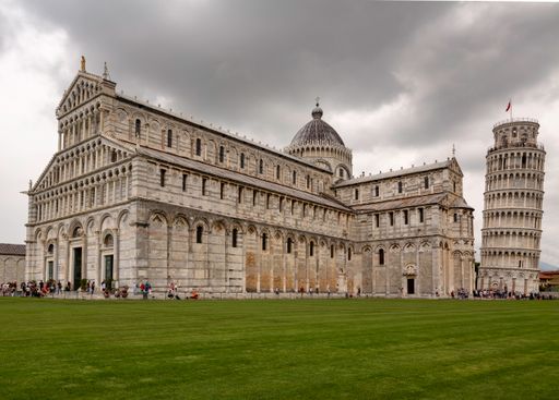The tourists around the cathedral and the leaning tower of Pisa, Italy