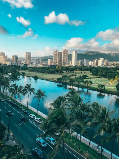 A closeup of a Golf course, street, and waterway in Honolulu, Hawaii on Oahu