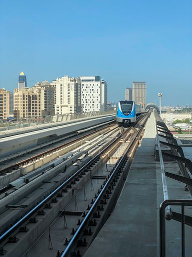 Metro Train arriving at the Jadaf Station on the green line of the Dubai Metro, UAE