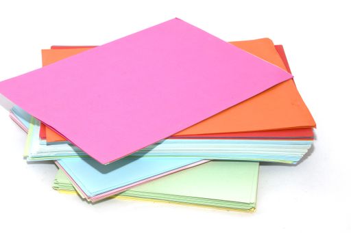 The sheets of colored a4 paper for printer on white background