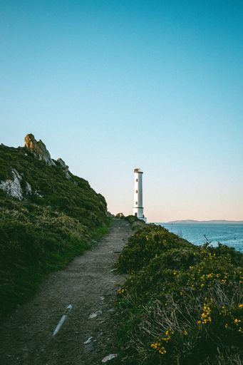 A Vertical view of the Cabo Home Lighthouse, which is located on the coast of Galicia in Spain