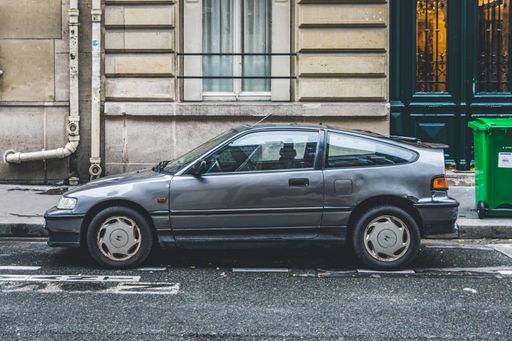 A Honda Civic CRX car parked in the alley