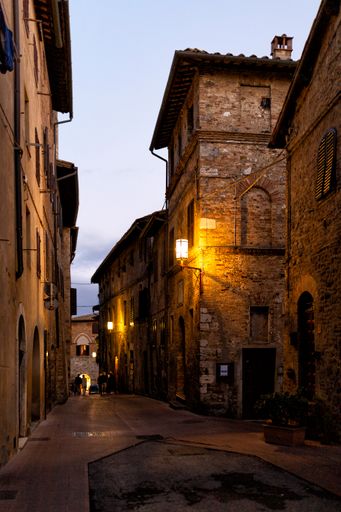 A beautiful shot of the ancient buildings and streets of Certaldo in the beginning of the evening in Tuscany, Italy