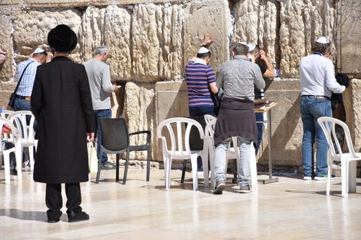 A praying scene at the Wailing (Western) Wall known in Islam as the Buraq Wall in Jerusalem, Israel