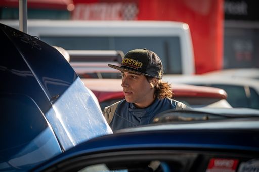 A closeup of a Pilot Guillem Serna with in the 2 Rally Sprint Racc