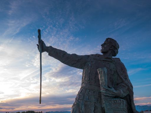 The statue of Croatian Duke Branimir under a blue sky in Nin, Croatia