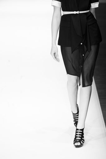 Model walking a catwalk during a fashion show