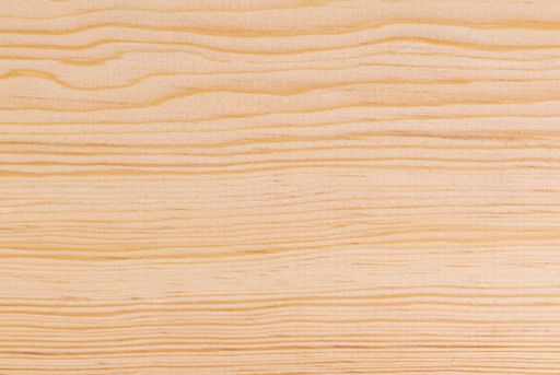 A flat beige wooden surface with brown curved lines - perfect for background
