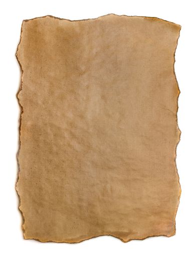 A vertical shot of a paper parchment on an isolated white background