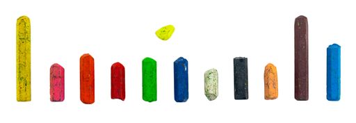 A row of colorful chalks isolated on a white background