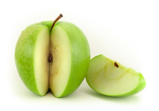 A slice of a green apple isolated on a white background