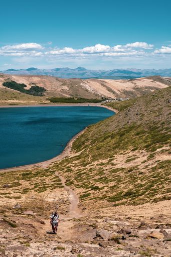 The blue sky over the lake and surrounding landscapes in spring