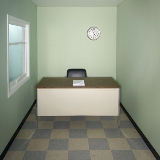 A closeup of papers on the table with a clock in a room