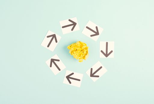 Teamwork, brainstoming for new ideas, solving a probem, strategy for a target, working together, arrow pointing to a goal