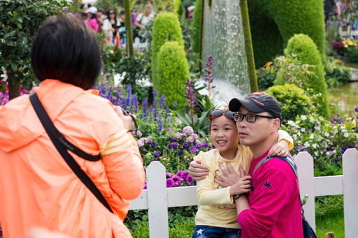 A family is taking photo in Hong Kong Flower Show 2018 in Victoria Park