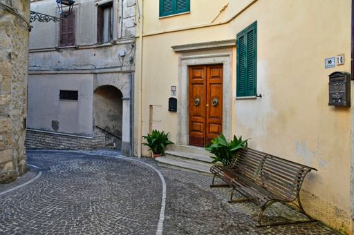 A closeup of a narrow street among the old stone houses of Ripi, a medieval town in Italy