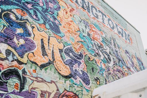 A street wall in Vancouver, Canada with graffitis