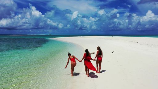 The Caucasian women from Russia on the beach in Fulhadhoo Island, the Maldives