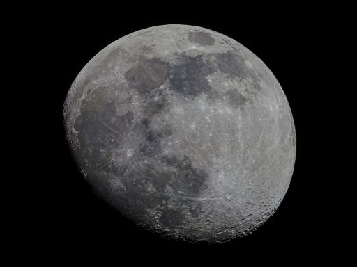 The moon with 86 percent visibility photographed from a telescope on a black background in March 2022