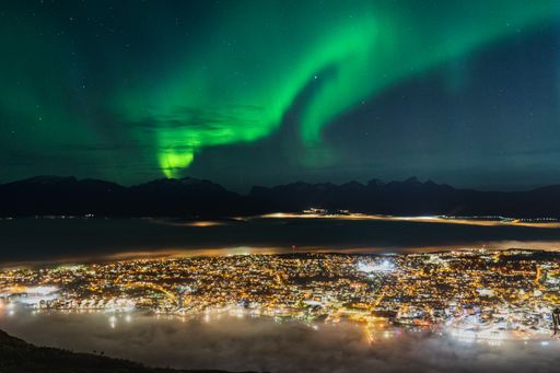 A beautiful scenery of Aurora borealis in the night sky of Tromso Lofoten Islands, Norway