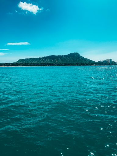 A vertical shot of paradise island off the coast -Diamond Head near Waikiki, Honolulu, Hawaii.