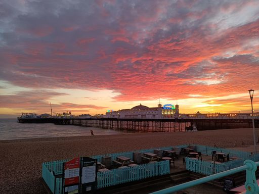 A mesmerizing view of sunset over the Brighton Palace Pier