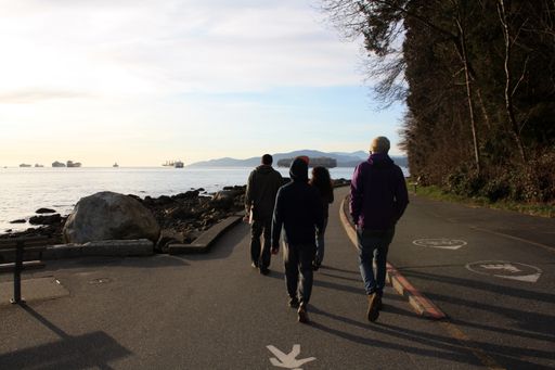 a photo of People are walking along the seawall in Stanley Park, Vancouver, British Columbia, Canada