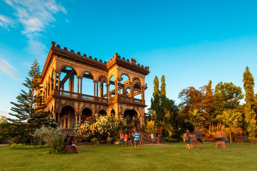 A low angle shot of The Ruins in Talisay, the Philippines captured on a bright sunny day