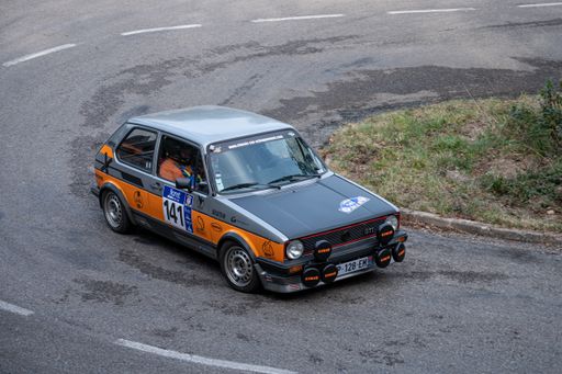 A closeup of a Volkswagen Golf GTI MKI in 9 Lloret de Mar asphalt rally