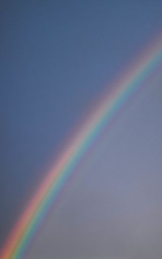A mesmerizing scenery of the rainbow in the sky