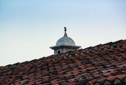 Smokestack detail in colonial house of La Antigua Guatemala, in Central America, Spanish heritage, outdoor architectural detail usually made of brick