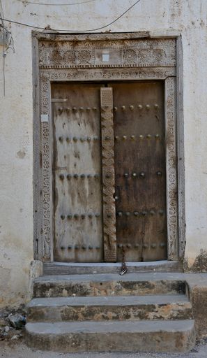 Old weathered doors with traditional carvings, Zanzibar, Tanzania, Africa