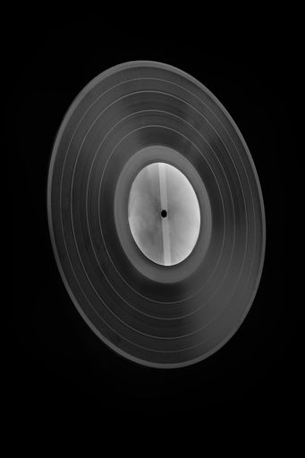 A vinyl disk isolated on a black background
