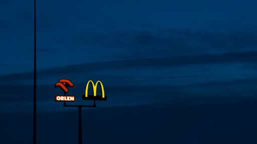 An evening view of the Orlen and McDonald's sign at the A1 Highway in Gdansk, Poland